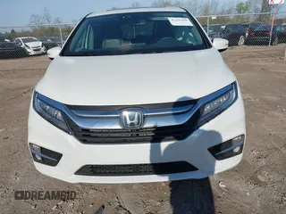 2020 Honda Odyssey Elite with VIN 5FNRL6H92LB014671, listed as a IAAI auction lot 42110389 with 104,180 mi miles and . Bid and sale history available at DreamBid. Image 12.