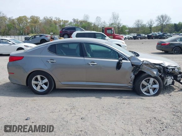 2015 Kia Optima LX z VIN 5XXGM4A76FG421945, wystawiony jako IAAI lot #42112703 z przebiegiem 106 050 mil mil oraz . Historia ofert i sprzedaży dostępna na DreamBid. Obrazek 14.