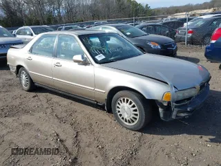 1995 Acura Legend L with VIN JH4KA7668SC012813, listed as a IAAI auction lot 41789026 with 242,265 mi miles and . Bid and sale history available at DreamBid. Image 1.