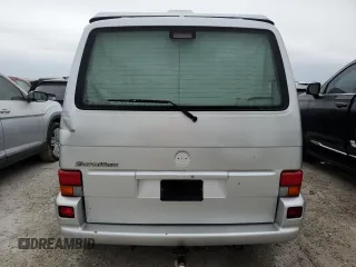 2003 Volkswagen EuroVan MV с VIN WV2NB47083H002700, выставлен на аукционе Copart как лот 76117874 с пробегом 186 942 миль миль и На запчасти • Non repairable. История ставок и продаж доступна на DreamBid. Изображение 6.