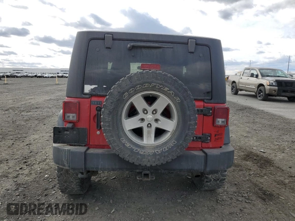 2012 Jeep Wrangler Rubicon with VIN 1C4BJWCG8CL202637, listed as a Copart auction lot 49145935 with 113,520 mi miles and Salvage Title. Bid and sale history available at DreamBid. Image 6.