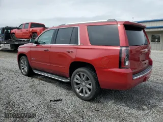 2015 Chevrolet Tahoe LTZ with VIN 1GNSKCKCXFR723104, listed as a Copart auction lot 50660325 with 198,740 mi miles and Salvage Title. Bid and sale history available at carsss.com. Image 2.