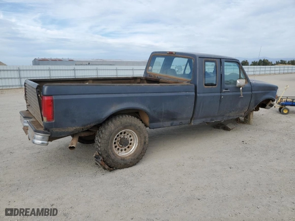 1994 Ford F-250 HD with VIN 1FTHX26G6RKB58004, listed as a Copart auction lot 77279664 with 124,556 mi miles and Salvage Title. Bid and sale history available at carsss.com. Image 3.