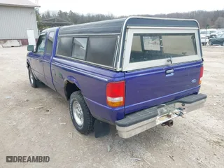 1997 Ford Ranger XL with VIN 1FTCR14A7VPA20353, listed as a IAAI auction lot 41986712 with 136,315 mi miles. Bid and sale history available at carsss.com. Image 3.