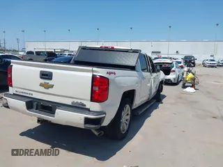 2014 Chevrolet Silverado 1500 High Country with VIN 3GCUKTEC4EG409072, listed as a IAAI auction lot 41986843 with 124,058 mi miles. Bid and sale history available at carsss.com. Image 4.