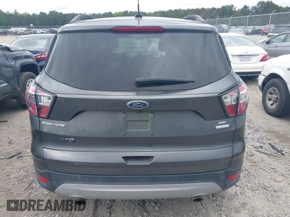 2017 Ford Escape SE z VIN 1FMCU0GD8HUE00754, wystawiony jako IAAI lot #42127911 z przebiegiem 169 487 mil mil oraz . Historia ofert i sprzedaży dostępna na DreamBid. Obrazek 16.