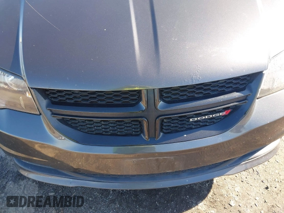2016 Dodge Grand Caravan SE with VIN 2C4RDGBG8GR335456, listed as a IAAI auction lot 41537809 with 125,081 mi miles and . Bid and sale history available at DreamBid. Image 6.
