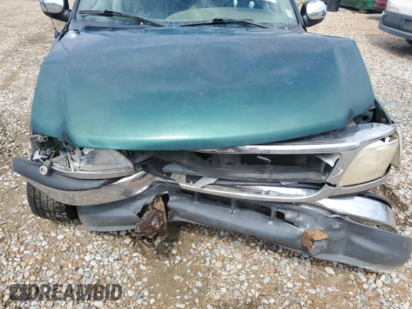 1999 Ford F-150 с VIN 1FTZX1723XNB11655, выставлен на аукционе Copart как лот 57573695 с пробегом Не указан миль и Списание • Salvage title. История ставок и продаж доступна на DreamBid. Изображение 11.