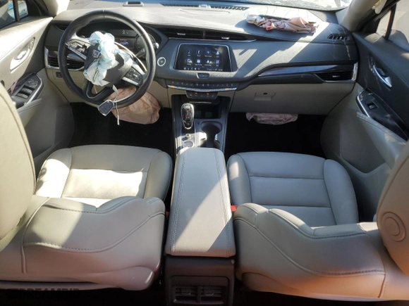 2023 Cadillac XT4 FWD Luxury with VIN 1GYAZAR47PF174705, listed as a Copart auction lot 41932365 with 34,227 mi miles and Salvage Title. Bid and sale history available at carsss.com. Image 8.