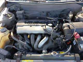 1999 Toyota Corolla VE with VIN 2T1BR12E0XC103688, listed as a IAAI auction lot 41938086 with 203,600 mi miles and . Bid and sale history available at DreamBid. Image 10.