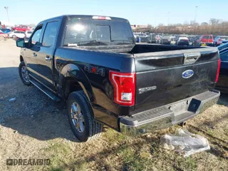 2015 Ford F-150 XLT with VIN 1FTEW1EG3FFC90398, listed as a IAAI auction lot 41665025 with 159,480 mi miles. Bid and sale history available at carsss.com. Image 3.