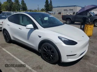 2022 Tesla Model Y Performance with VIN 7SAYGDEFXNF407340, listed as a Copart auction lot 54376895 with 56,709 mi miles and Salvage Title. Bid and sale history available at DreamBid. Image 4.