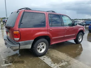2000 Ford Explorer XLT z VIN 1FMZU63E3YZB39063, wystawiony jako Copart lot #74105104 z przebiegiem 231 003 mil mil oraz Szkoda całkowita • Salvage title. Historia ofert i sprzedaży dostępna na DreamBid. Obrazek 3.
