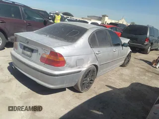 2002 BMW 3 Series 325i with VIN WBAET374X2NJ21581, listed as a IAAI auction lot 42120696 with 247,218 mi miles and . Bid and sale history available at DreamBid. Image 4.