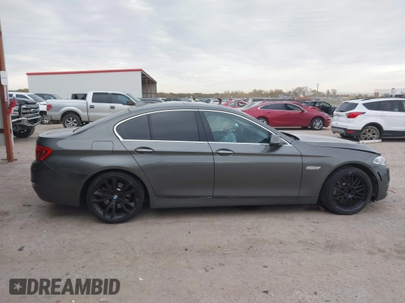 2014 BMW 5 Series 535d with VIN WBAXA5C58ED689864, listed as a IAAI auction lot 40983130 with 139,104 mi miles and . Bid and sale history available at carsss.com. Image 13.