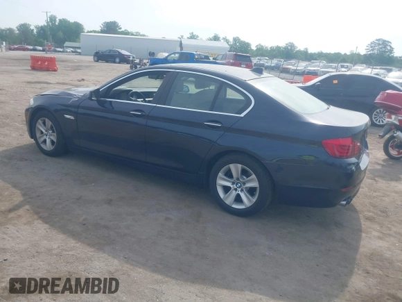 2013 BMW 5 Series 528i with VIN WBAXG5C52DD230956, listed as a IAAI auction lot 42107778 with 126,377 mi miles and . Bid and sale history available at carsss.com. Image 3.