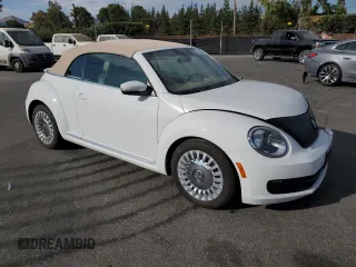 2015 Volkswagen Beetle 1.8T with VIN 3VW517AT6FM802771, listed as a Copart auction lot 72225834 with 128,946 mi miles and Salvage title. Bid and sale history available at DreamBid. Image 4.