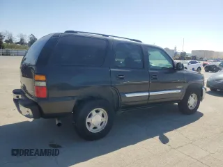 2004 GMC Yukon SLE z VIN 1GKEC13V94R131511, wystawiony jako Copart lot #53184435 z przebiegiem 163 917 mil mil oraz Tytuł czysty. Historia ofert i sprzedaży dostępna na DreamBid. Obrazek 3.