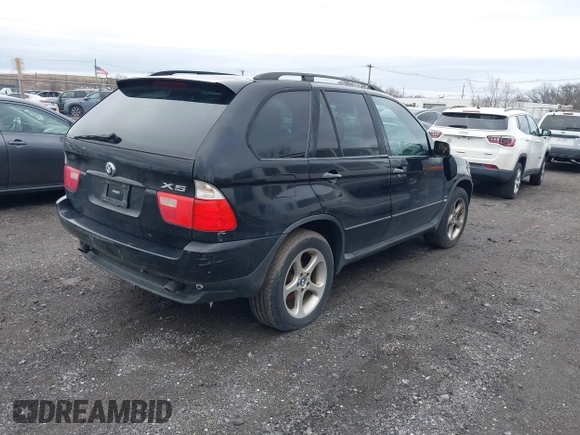 2001 BMW X5 3.0i with VIN WBAFA53501LM71185, listed as a IAAI auction lot 41610473 with 141,322 mi miles. Bid and sale history available at carsss.com. Image 4.