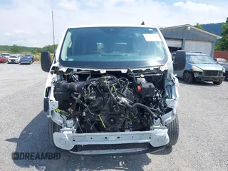 2021 Ford Transit Cargo with VIN 1FTYE1Y82MKA02296, listed as a IAAI auction lot 42377720 with 50,942 mi miles and . Bid and sale history available at DreamBid. Image 12.