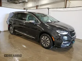 2023 Chrysler Pacifica Hybrid Limited with VIN 2C4RC1S75PR626237, listed as a Copart auction lot 60257305 with 61,864 mi miles and Salvage title. Bid and sale history available at DreamBid. Image 4.