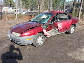 1997 Saturn SL with VIN 1G8ZF528XVZ325466, listed as a IAAI auction lot 41576703 with 237,089 mi miles. Bid and sale history available at carsss.com. Image 2.