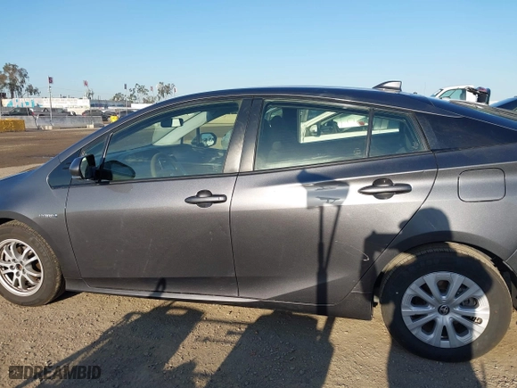 2020 Toyota Prius L Eco with VIN JTDKARFUXL3117737, listed as a IAAI auction lot 41988550 with 64,865 mi miles. Bid and sale history available at carsss.com. Image 15.