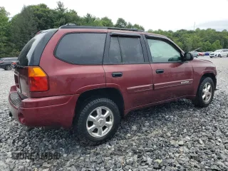2004 GMC Envoy SLT with VIN 1GKDT13S342336784, listed as a Copart auction lot 66704184 with 169,431 mi miles and Salvage Title. Bid and sale history available at carsss.com. Image 3.