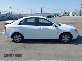 2009 Kia Spectra LX z VIN KNAFE222995623894, wystawiony jako IAAI lot #42385181 z przebiegiem 119 030 mil mil oraz . Historia ofert i sprzedaży dostępna na DreamBid. Obrazek 13.