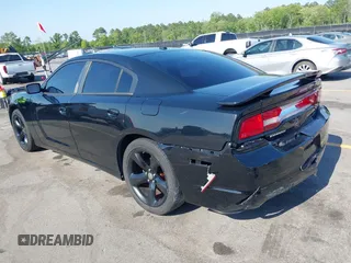 2012 Dodge Charger SXT with VIN 2C3CDXHG2CH258844, listed as a IAAI auction lot 42025908 with 214,529 mi miles. Bid and sale history available at carsss.com. Image 3.