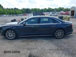 2015 Audi A8 4.0T with VIN WAU32AFD4FN002477, listed as a IAAI auction lot 42157514 with 151,729 mi miles and . Bid and sale history available at DreamBid. Image 14.