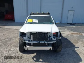 2013 Toyota Tacoma with VIN 3TMLU4EN9DM113137, listed as a IAAI auction lot 41709140 with 57,704 mi miles and . Bid and sale history available at DreamBid. Image 13.