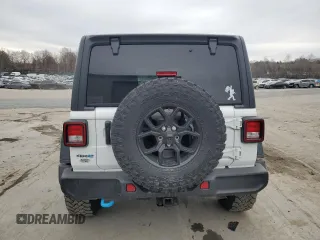 2024 Jeep Wrangler Sport S with VIN 1C4RJXN68RW283543, listed as a Copart auction lot 57752525 with 4,334 mi miles and Salvage title. Bid and sale history available at DreamBid. Image 6.