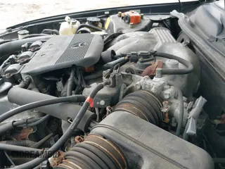 2000 Toyota Camry LE z VIN 4T1BF28K1YU942082, wystawiony jako IAAI lot #43103125 z przebiegiem 174 039 mil mil oraz . Historia ofert i sprzedaży dostępna na DreamBid. Obrazek 19.