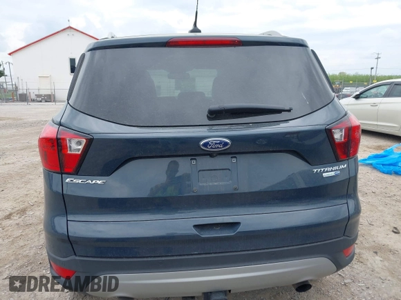 2019 Ford Escape Titanium with VIN 1FMCU9J95KUC19062, listed as a IAAI auction lot 42112188 with 26,100 mi miles. Bid and sale history available at carsss.com. Image 15.