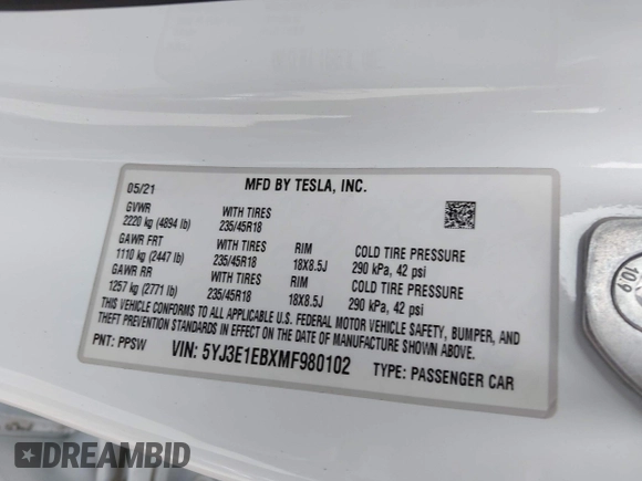 2021 Tesla Model 3 Long Range with VIN 5YJ3E1EBXMF980102, listed as a IAAI auction lot 41944364 with 48,766 mi miles and . Bid and sale history available at carsss.com. Image 9.