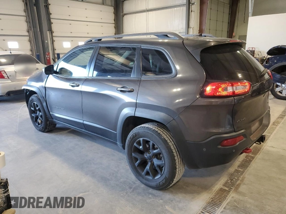 2015 Jeep Cherokee Trailhawk with VIN 1C4PJMBS5FW615845, listed as a Copart auction lot 52824635 with 134,873 mi miles and Salvage Title. Bid and sale history available at carsss.com. Image 2.
