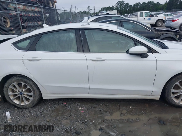 2020 Ford Fusion SE z VIN 3FA6P0HD8LR160330, wystawiony jako IAAI lot #42348552 z przebiegiem 95 610 mil mil oraz . Historia ofert i sprzedaży dostępna na DreamBid. Obrazek 13.