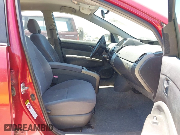 2007 Toyota Prius z VIN JTDKB20U477616450, wystawiony jako IAAI lot #42304173 z przebiegiem 258 469 mil mil oraz . Historia ofert i sprzedaży dostępna na DreamBid. Obrazek 5.