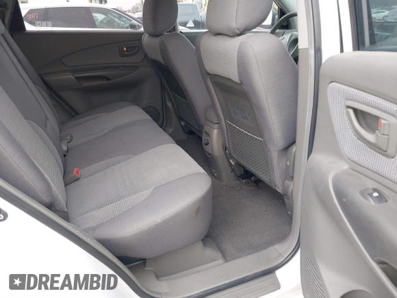 2006 Hyundai Tucson GL with VIN KM8JM12BX6U467288, listed as a IAAI auction lot 41679827 with 146,973 mi miles. Bid and sale history available at carsss.com. Image 8.