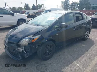 2014 Toyota Prius Four with VIN JTDKN3DU0E0376097, listed as a IAAI auction lot 41909796 with 122,973 mi miles. Bid and sale history available at carsss.com. Image 2.