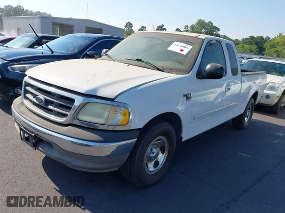 2003 Ford F-150 XL with VIN 1FTRX17W13NB93902, listed as a IAAI auction lot 42670081 with 145,918 mi miles and . Bid and sale history available at DreamBid. Image 2.
