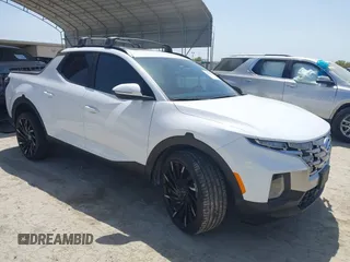2023 Hyundai Santa Cruz SEL Premium z VIN 5NTJDDAF2PH075610, wystawiony jako IAAI lot #41855459 z przebiegiem 17 872 mil mil oraz . Historia ofert i sprzedaży dostępna na DreamBid. Obrazek 1.