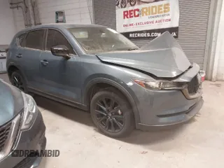 2021 Mazda CX-5 Touring with VIN JM3KFACM9M0379508, listed as a IAAI auction lot 41577251 with 46,519 mi miles. Bid and sale history available at carsss.com. Image 1.