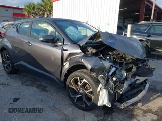 2020 Toyota C-HR LE with VIN JTNKHMBXXL1087676, listed as a IAAI auction lot 41662260 with 68,870 mi miles. Bid and sale history available at carsss.com. Image 1.