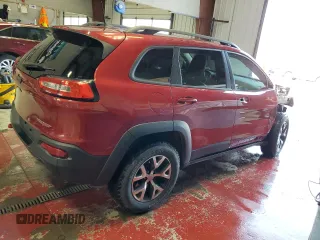 2016 Jeep Cherokee Trailhawk with VIN 1C4PJMBS2GW298186, listed as a Copart auction lot 62999945 with 153,064 mi miles and Salvage title. Bid and sale history available at DreamBid. Image 3.