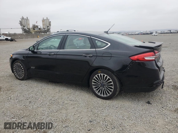 2017 Ford Fusion Titanium z VIN 3FA6P0SU5HR105415, wystawiony jako Copart lot #59779715 z przebiegiem 88 988 mil mil oraz Szkoda całkowita • Salvage title. Historia ofert i sprzedaży dostępna na DreamBid. Obrazek 2.