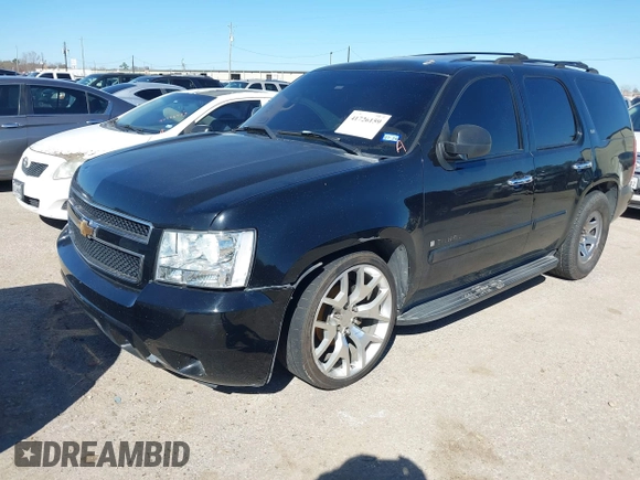 2007 Chevrolet Tahoe LTZ with VIN 1GNFC13J67R245233, listed as a IAAI auction lot 41726159 with 203,841 mi miles and . Bid and sale history available at DreamBid. Image 2.