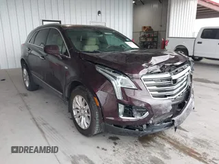 2018 Cadillac XT5 FWD with VIN 1GYKNARS3JZ128633, listed as a IAAI auction lot 41019946 with 99,363 mi miles. Bid and sale history available at carsss.com. Image 1.