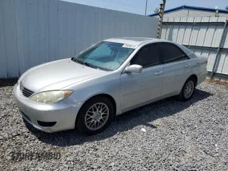 2006 Toyota Camry LE z VIN 4T1BF30K16U630147, wystawiony jako Copart lot #59696815 z przebiegiem 168 727 mil mil oraz Czysty tytuł • Clean title. Historia ofert i sprzedaży dostępna na DreamBid. Obrazek 1.